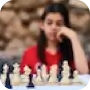 woman wearing red playing chess